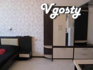 Квартира-студія, розташована на 12 поверсі 21 поверхового нового - Квартири подобово без посередників - Vgosty
