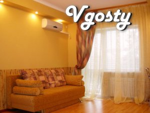 Luxury two-bedroom luxury apartment, studio. Landmark: - Apartments for daily rent from owners - Vgosty