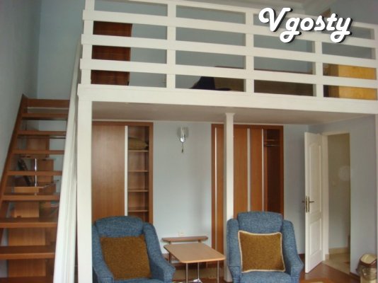 Spacious light room (28 sq ft, ceiling height 4.6 m) - Apartments for daily rent from owners - Vgosty