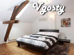 Ynteresnaya and neordynarnaya attic type apartment in the city center - Apartments for daily rent from owners - Vgosty