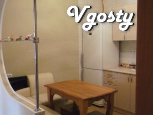 A small house with a fireplace on the terrace on the street. Trinity - Apartments for daily rent from owners - Vgosty