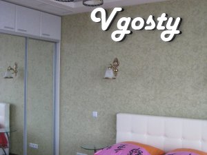 Квартира люкс в елітному Міст Сіті з балконом, вид на Дніпро, wi-fi - Квартири подобово без посередників - Vgosty